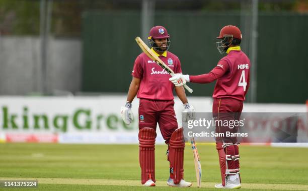 Dublin , Ireland - 5 May 2019; Shai Hope of West Indies, right, acknowledges the crowd with John Campbell after scoring half a century during the One...