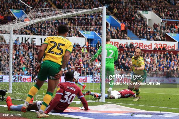 Teemu Pukki of Norwich City celebrates scoring the opening goal with Hernandez during the Sky Bet Championship match between Aston Villa and Norwich...