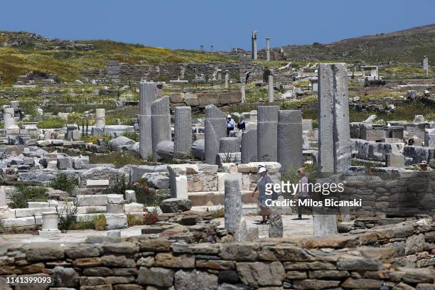 World Heritage protected ancient archaeological site on the uninhabited island of Delos on May 3, 2019 next to island of Mykonos in the Cyclades,...