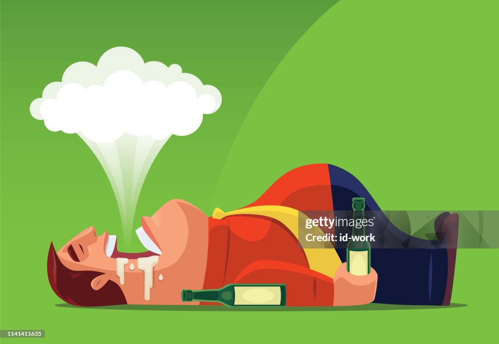 Businessman lying on back and holding bottle of beer