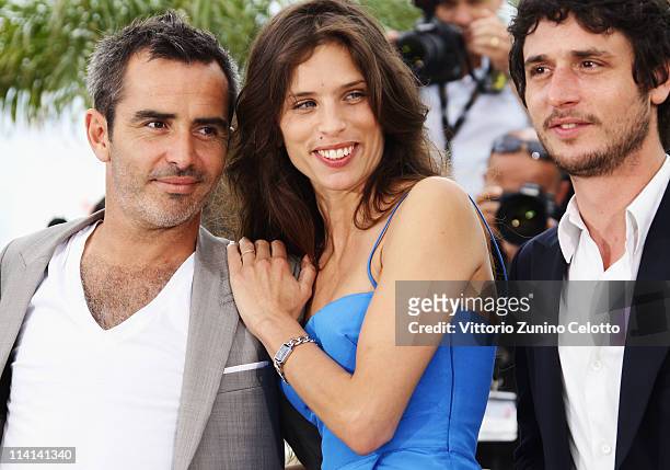 Actor Arnaud Henriet , director Maiwenn Le Besco and Jeremie Elkaim attend the "Polisse" photocall at the Palais Des Festivals during the 64th Cannes...