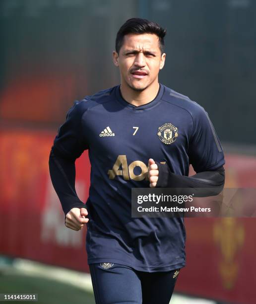 Alexis Sanchez of Manchester United in action during a first team training session at Aon Training Complex on April 09, 2019 in Manchester, England.