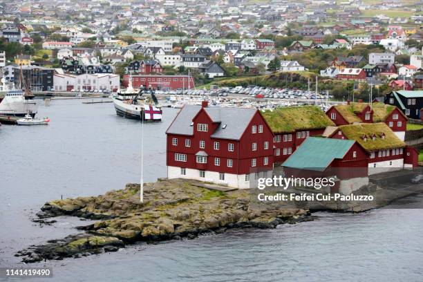 tinganes peninsula on the bay of tórshavn, faroe islands - torshavn stock pictures, royalty-free photos & images