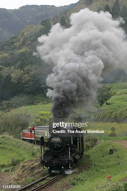 Steam Locomotive "SL Aso Boy" runs on April 23, 2005 in Minamiaso, Kumamoto, Japan.