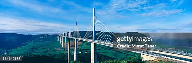viaduct spanning a valley - millau viaduct stock pictures, royalty-free photos & images