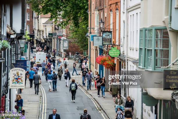 High angle view of people walking the historic streets of the City of York, Yorkshire, United Kingdom.