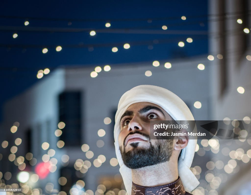 Arab young man on night street