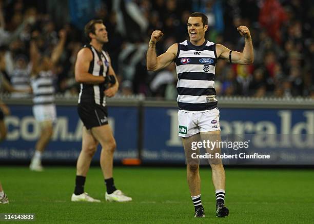 Matthew Scarlett of the Cats celebrates the Cats win over the Magpies during the round eight AFL match between the Geelong Cats and the Collingwood...