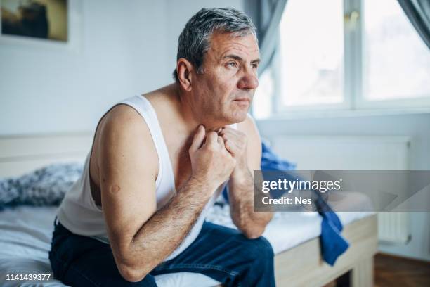 the man is waking up in the hotel room - eastern europe stock pictures, royalty-free photos & images