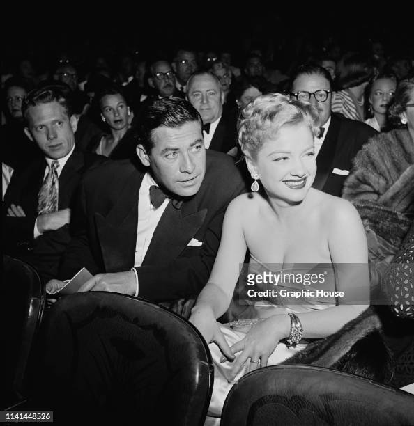 American actors John Hodiak and Anne Baxter attend the premiere of The Snows of Kilimanjaro, US, 17th September 1952.