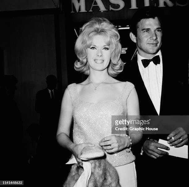American actress, director and producer Connie Stevens and American actor James Stacy attend the premiere of 'The Unsinkable Molly Brown', US, 11th...