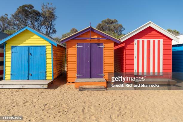 brighton beach bathing huts, melbourne, australia - beach hut stock pictures, royalty-free photos & images
