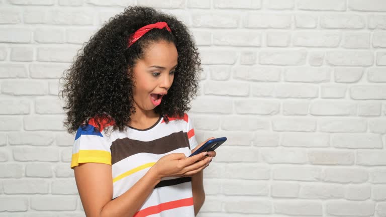 https://media.gettyimages.com/id/1141455165/video/happy-euphoric-girl-woman-reading-good-news-on-mobile-telephone.jpg?b=1&s=640x640&k=20&c=HEbwAa7Htg_OwwCIqfr_JA-9ldefskwBI88wqogKScQ=