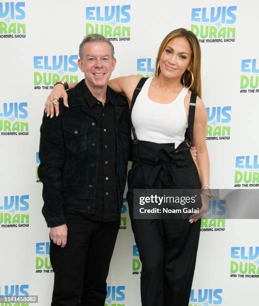 Elvis Duran and Jennifer Lopez pose for a photo backstage at "The Elvis Duran Z100 Morning Show" at the Z100 Studio on April 09, 2019 in New York...