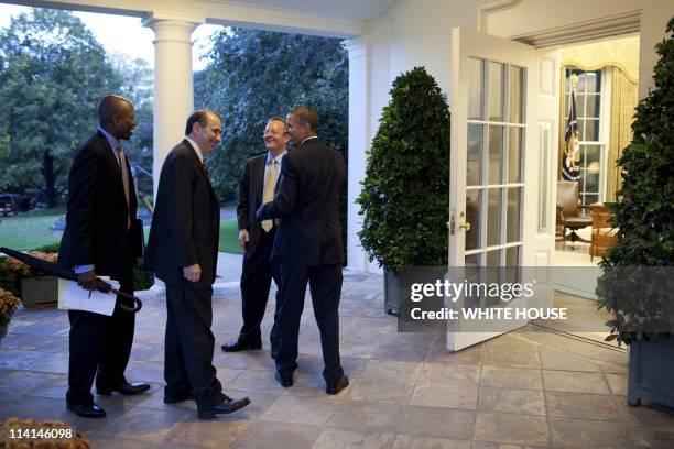 White House Pictures In Washington, United States On October 27, 2010-President Barack Obama chats with, from left, Personal Aide Reggie Love, Senior...