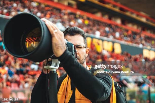 sports photographer - photographer with camera stock pictures, royalty-free photos & images