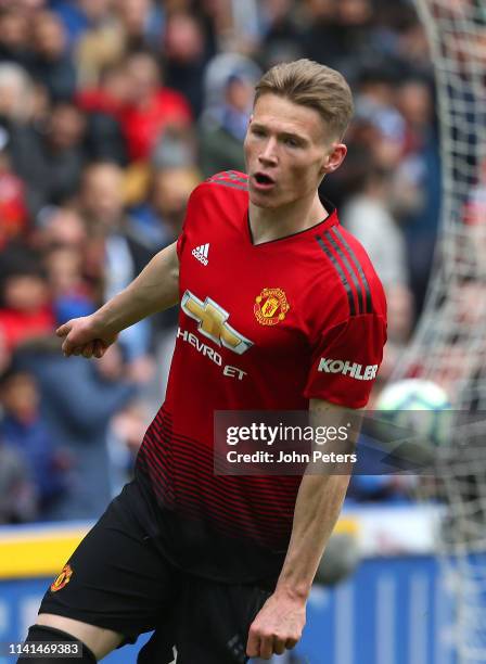 Scott McTominay of Manchester United celebrates scoring the first goal during the Premier League match between Huddersfield Town and Manchester...