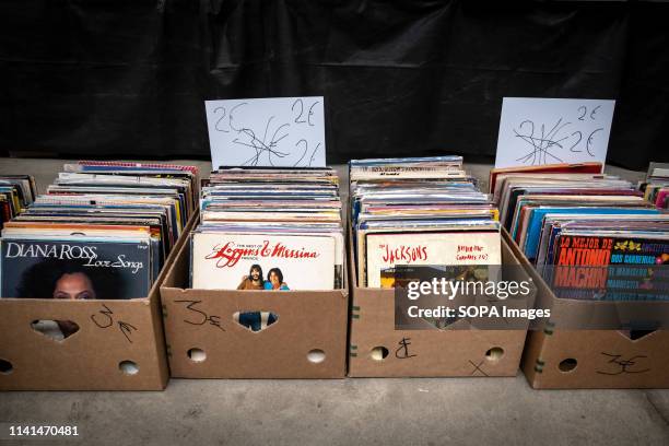 Several cardboard boxes containing discs for sale are seen during the XXVII International Record Fair of Barcelona. The XXVII International Record...