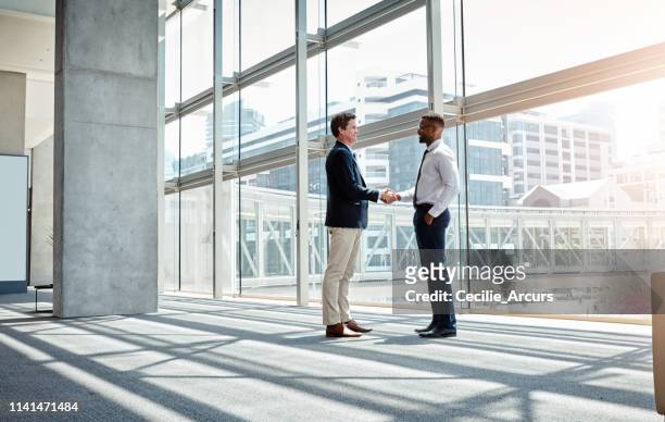 it’s all about building that business relationship - handshake stock pictures, royalty-free photos & images