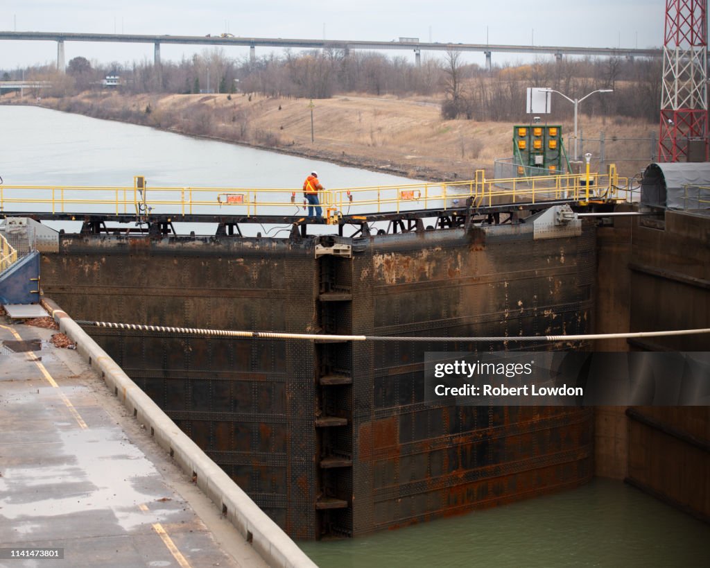Worker At Canal
