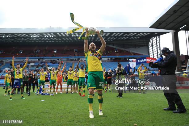 Teemu Pukki of Norwich City celebrates as he lifts the Championship trophy during the Sky Bet Championship match between Aston Villa and Norwich City...