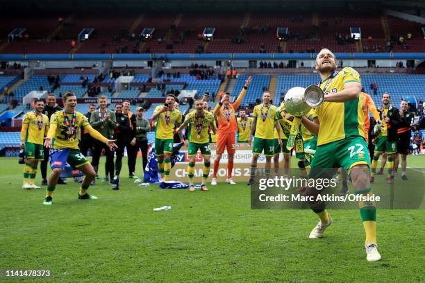 Teemu Pukki of Norwich City celebrates as he lifts the Championship trophy during the Sky Bet Championship match between Aston Villa and Norwich City...