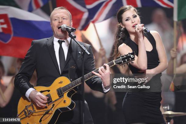 Lena Meyer-Landrut of Germany and co-host Stefan Raab perform during the dress rehearsal ahead of the finals of the 2011 Eurovision Song Contest on...