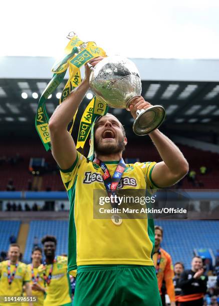 Teemu Pukki of Norwich City celebrates as he lifts the Championship trophy during the Sky Bet Championship match between Aston Villa and Norwich City...