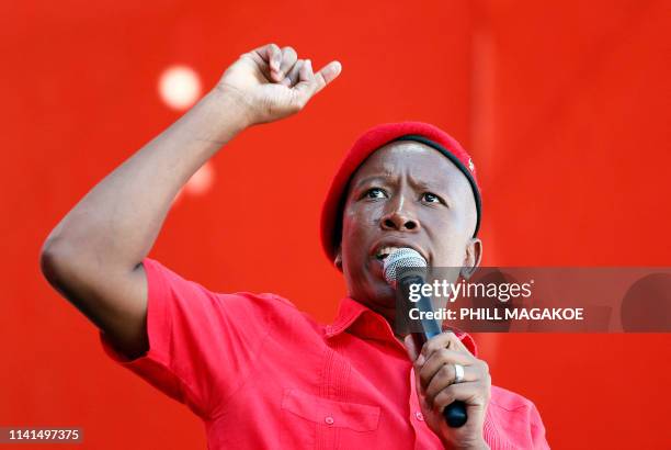 Opposition party Economic Freedom Fighters leader Julius Malema speaks during EFF final election rally at Orlando Stadium in Soweto on May 5 ahead of...