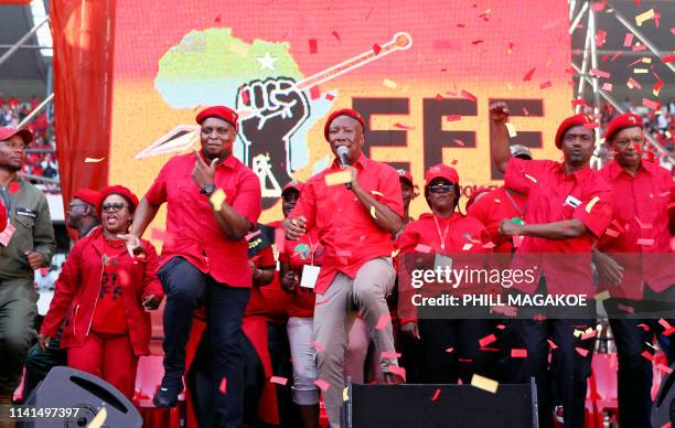 Opposition party Economic Freedom Fighters leader Julius Malema sing and dance on stage with members of his leadership during EFF final election...