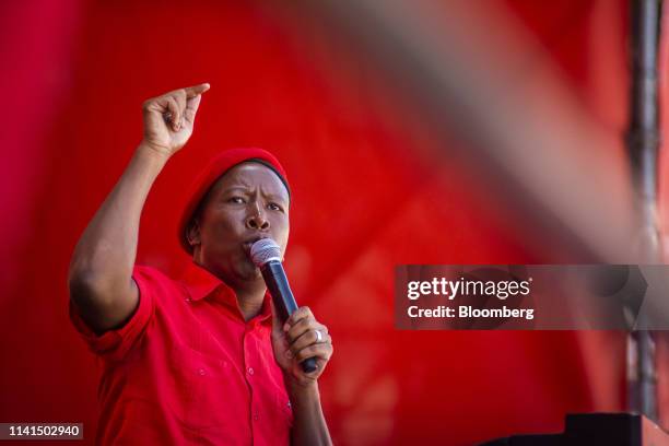 Julius Malema, leader of the Economic Freedom Fighters , gestures as he speaks at a party rally in Soweto, Johannesburg, South Africa, on Sunday, May...