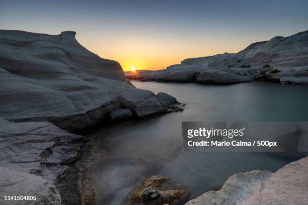 scenic rocky landscape at sunset - mario calma stockfoto's en -beelden