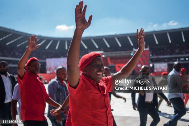 South African far-left and opposition party Economic Freedom Fighters leader Julius Malema acknowledges the crowd during the final EFF presidential...