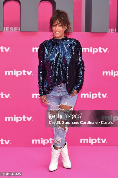 Amel Bent poses on the pink carpet during the 2nd Canneseries - International Series Festival : Day Five on April 09, 2019 in Cannes, France.
