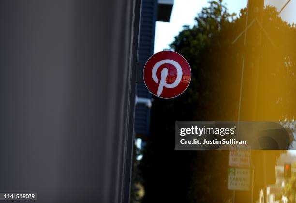 The Pinterest logo is displayed at the headquarters on April 09, 2019 in San Francisco, California. Social sharing site Pinterest is preparing for...