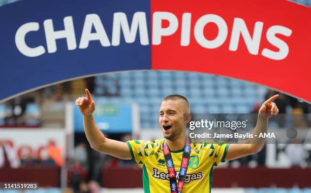 Moritz Leitner of Norwich City celebrates promotion and winning the Sky Bet Championship after the Sky Bet Championship match between Aston Villa and...