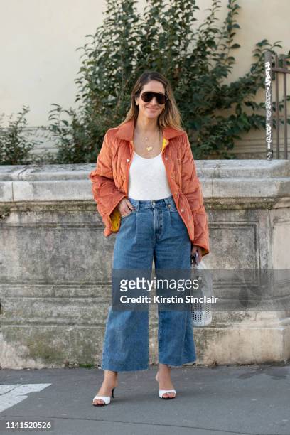 Fashion consultant Tiany Kiriloff wears an Aalto jacket, Coccinelle bag, Levi’s jeans, Giuseppe Zanotti shoes and Tods sunglasses on February 27,...
