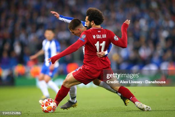 Mohamed Salah of Liverpool tackles Otavio Edmilson da Silva Monteiro of Porto during the UEFA Champions League Quarter Final first leg match between...