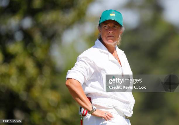 Fanny Sunesson, caddie for Henrik Stenson of Sweden ,, looks on during a practice round prior to the Masters at Augusta National Golf Club on April...
