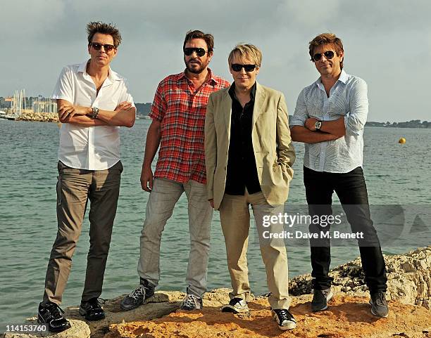 John Taylor, Simon Le Bon, Nick Rhodes, and Roger Taylor of Duran Duranpose for a photocall at the 64th Annual Cannes Film Festival on May 13, 2011...