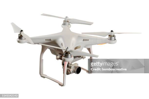drone dji phantom 4 in flight - dji phantom 4 stock pictures, royalty-free photos & images