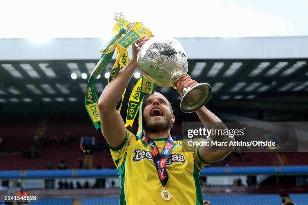 Teemu Pukki of Norwich City celebrates as he lifts the Championship trophy during the Sky Bet Championship match between Aston Villa and Norwich City...