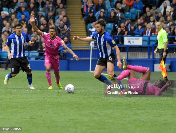 Morgan Fox and Eberechi Eze after a close tackle during the FA Championship football match between Sheffield Wednesday FC and Queens Park Rangers FC...