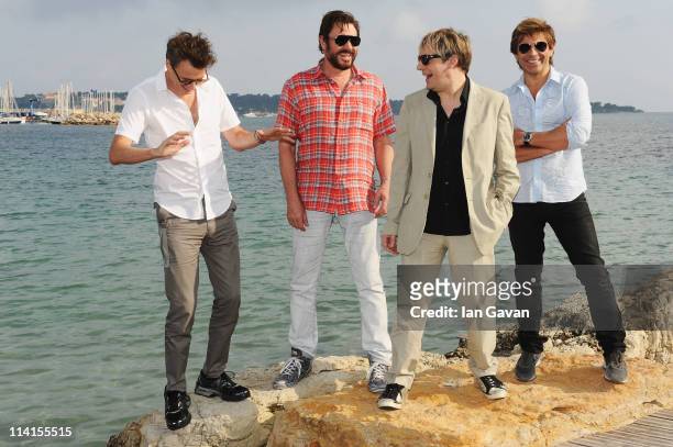 John Taylor, Simon Le Bon, Nick Rhodes, Roger Taylor of Duran Duran poses at a photocall during the 64th Annual Cannes Film Festival on May 13, 2011...