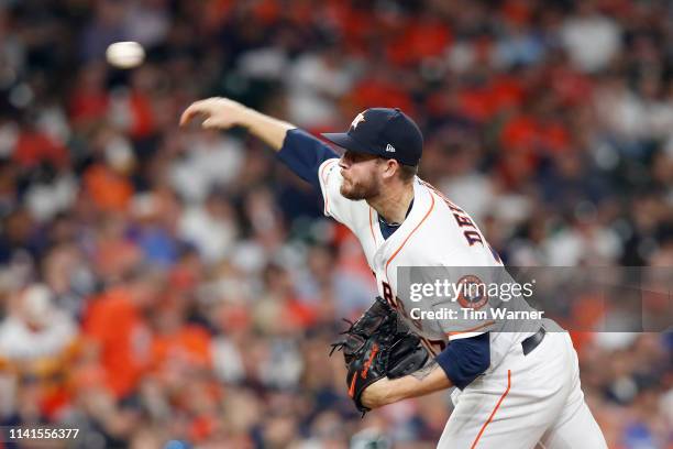 Chris Devenski of the Houston Astros pitches in the eighth inning against the Oakland Athletics at Minute Maid Park on April 6, 2019 in Houston,...