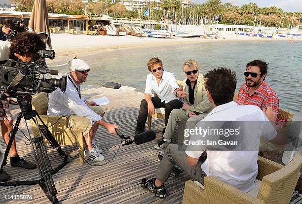 Musicians Roger Taylor, Nick Rhodes, Simon Le Bon and John Taylor of Duran Duran interview at a photocall during the 64th Annual Cannes Film Festival...