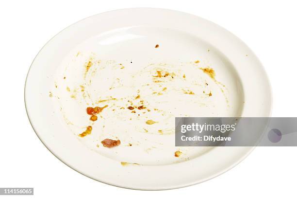 empty white plate with smears of food - dirty plate stock pictures, royalty-free photos & images