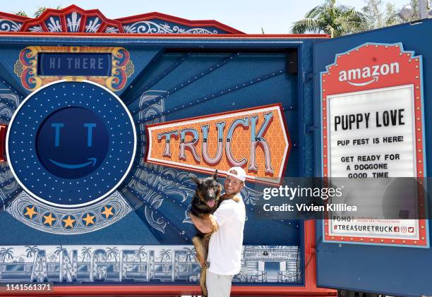 Colton Underwood and Kane , his rescue dog from Korea, enjoy the Amazon Treasure Truck Pup Fest Event on May 5, 2019 in Los Angeles, California. For...
