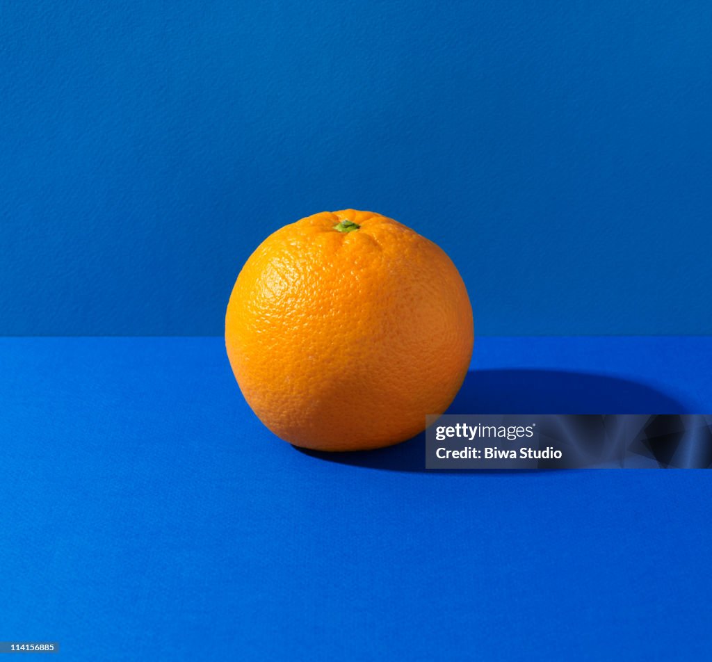 Orange on blue background