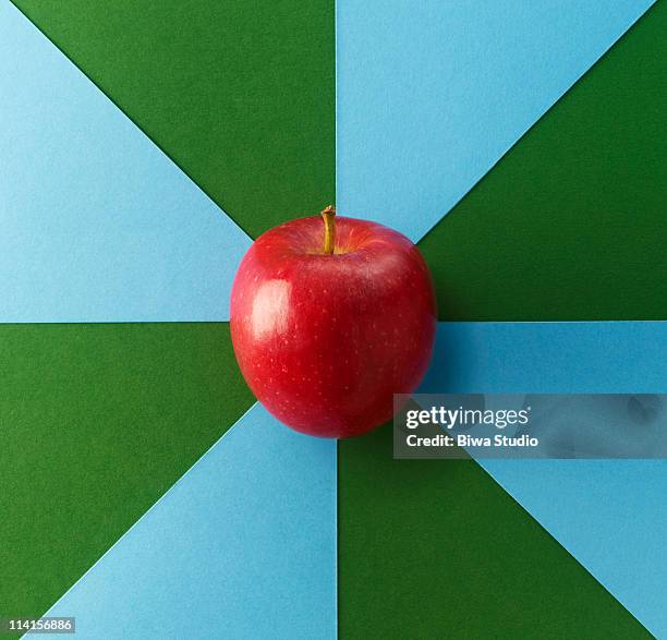 Apple On Blue Green Background, Foto de stock